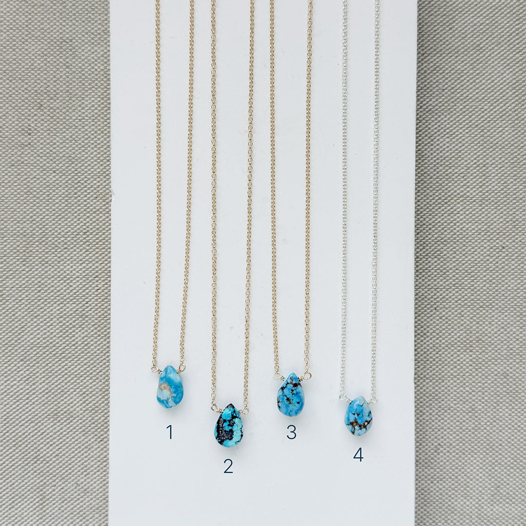 Four tear drop shaped Golden Hills turquoise necklaces