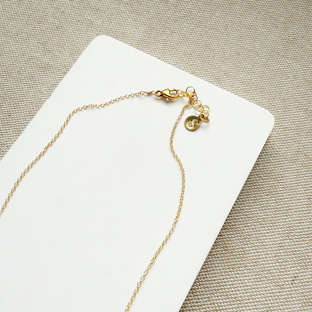Clasp detail of gold necklace