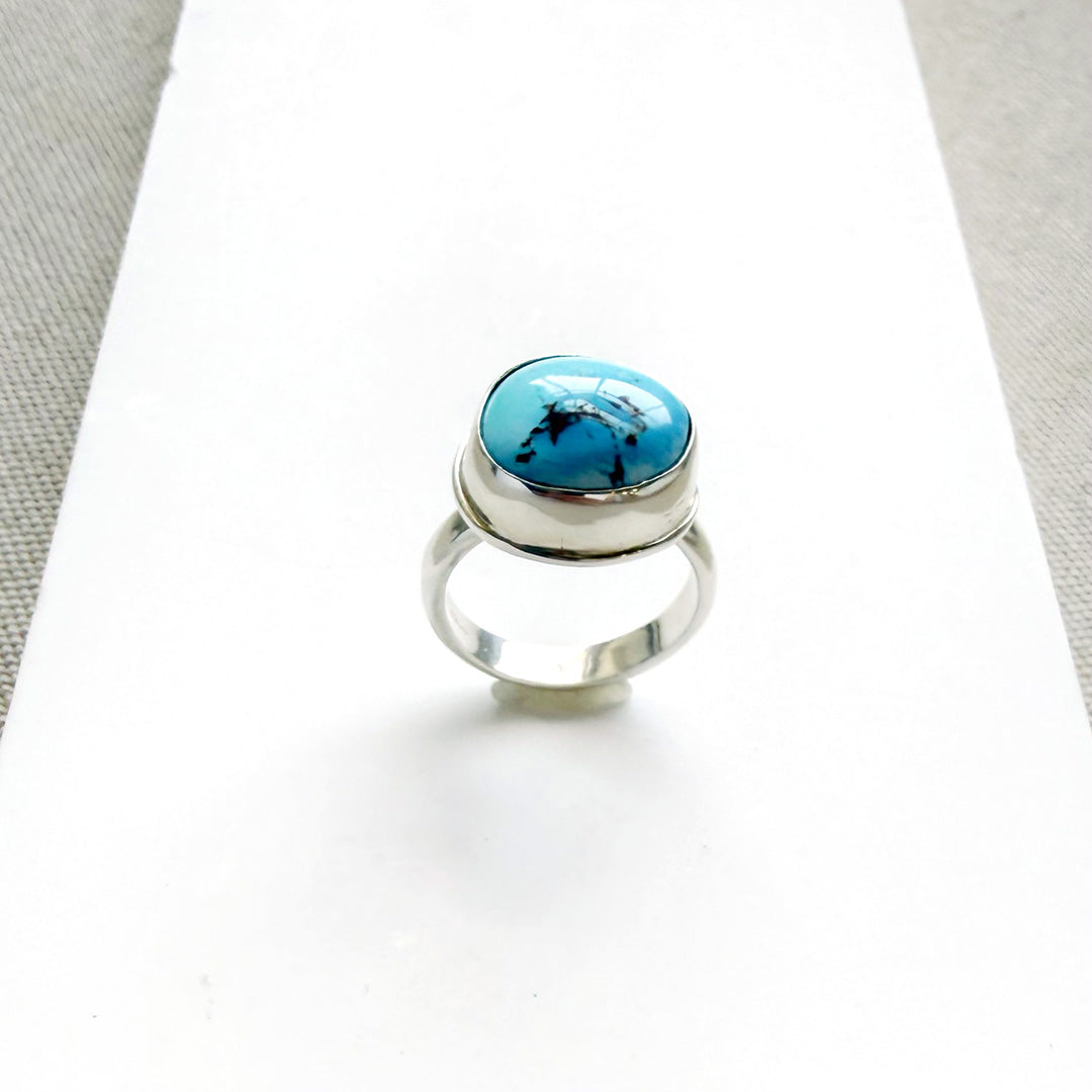 One of a kind Golden Hills Turquoise silver ring on a white background