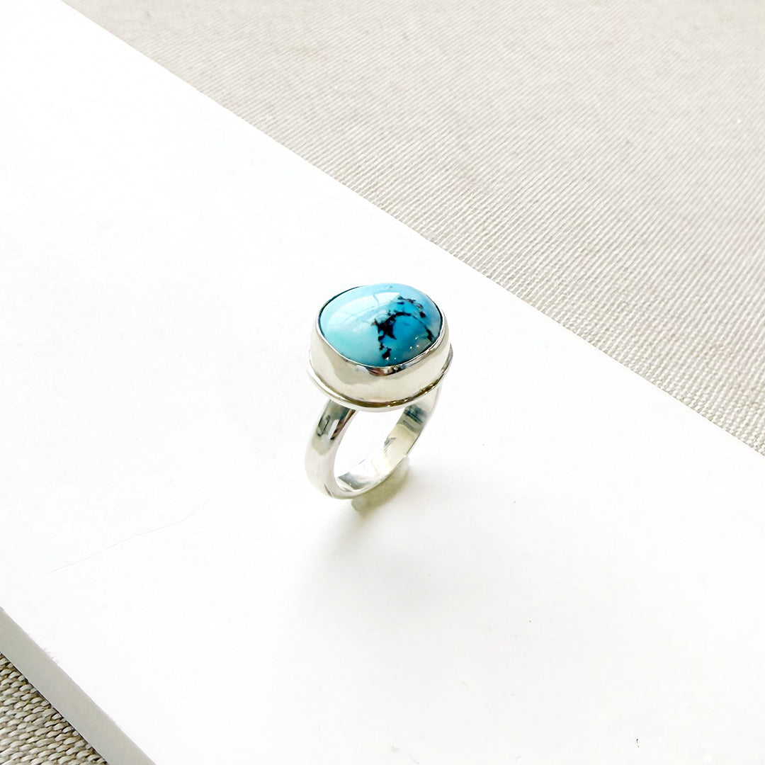 One of a kind Golden Hills Turquoise silver ring on a white background
