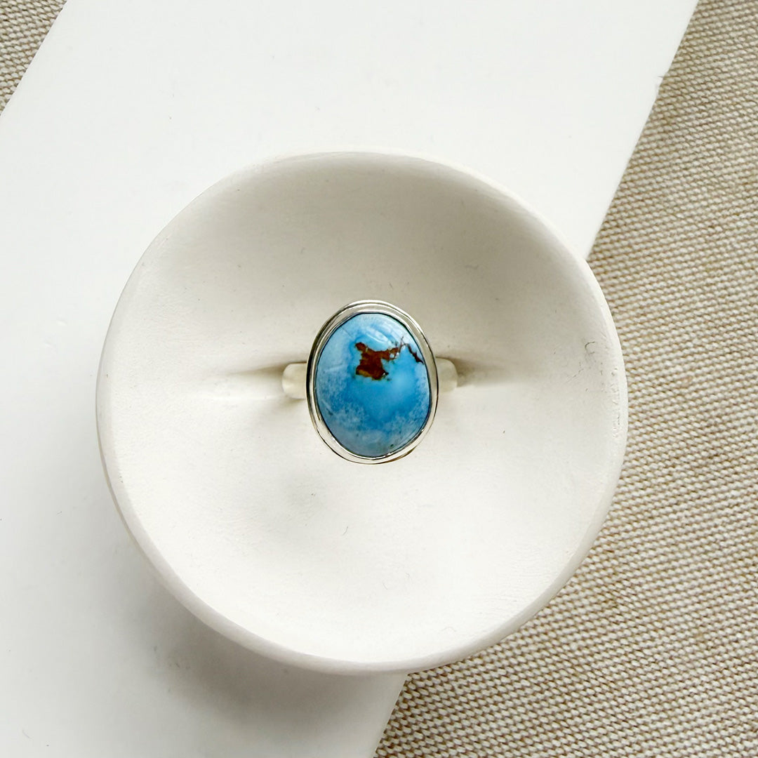 One of a kind Golden Hills Turquoise silver ring on a white background