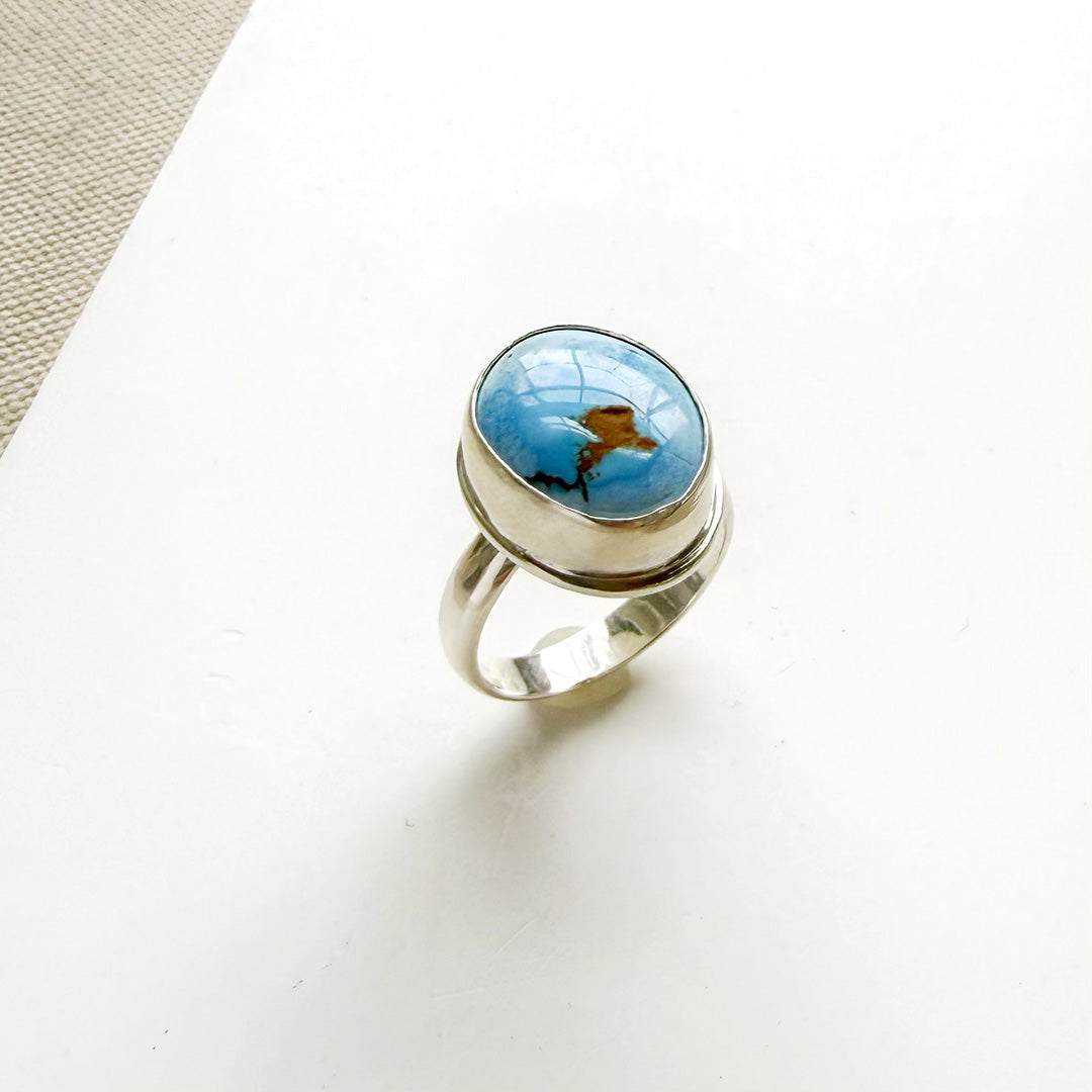 One of a kind Golden Hills Turquoise silver ring on a white background