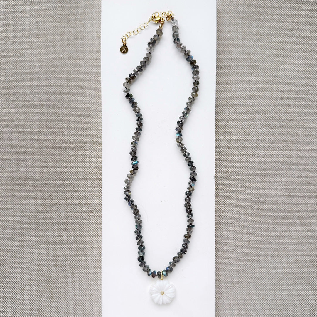 Knotted labradorite necklace with flower shaped carved mother of pearl pendant