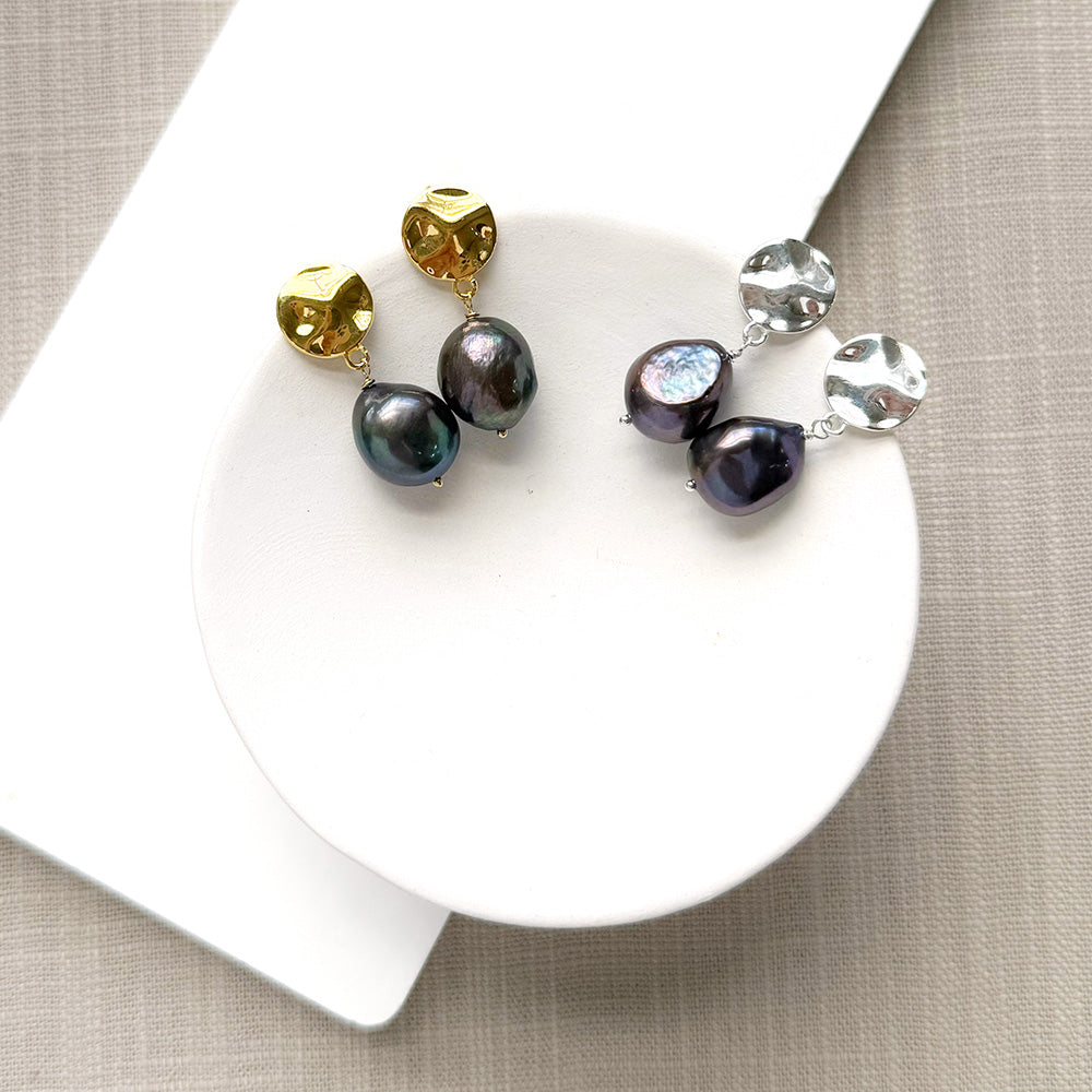 Peacock pearl earrings with a gold and silver disc