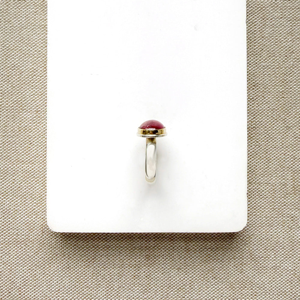 Pink Tourmaline Mixed Metal ring in a dish