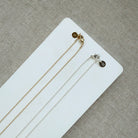 Clasp detail of gold and silver necklaces