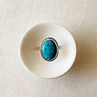 Arizona turquoise ring in a white dish