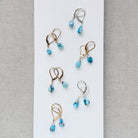 Tear drop shaped Golden Hills turquoise earrings in gold and silver