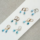 Tear drop shaped Golden Hills turquoise earrings in gold and silver