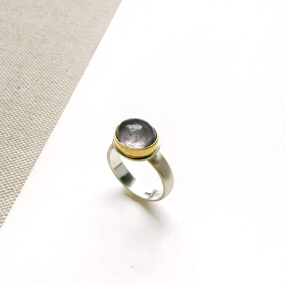 Oval berry spinel ring in a mixed metal setting