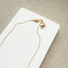 Clasp detail of gold necklace