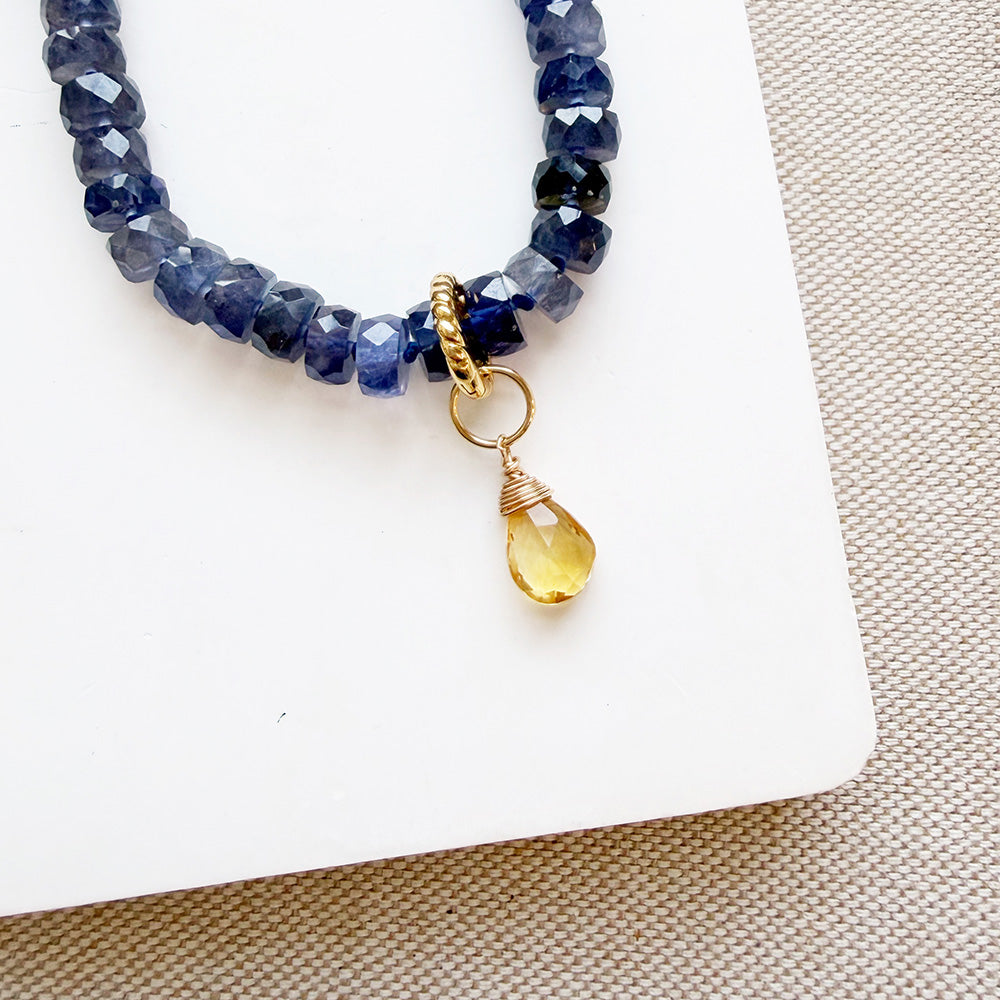 Citrine teardrop shaped charms on a gemstone necklace