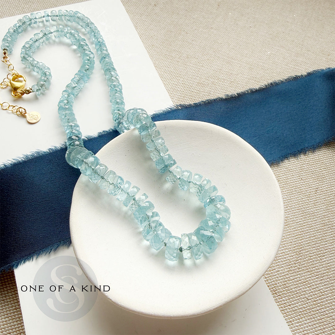 Faceted aquamarine knotted necklace with one of a kind icon