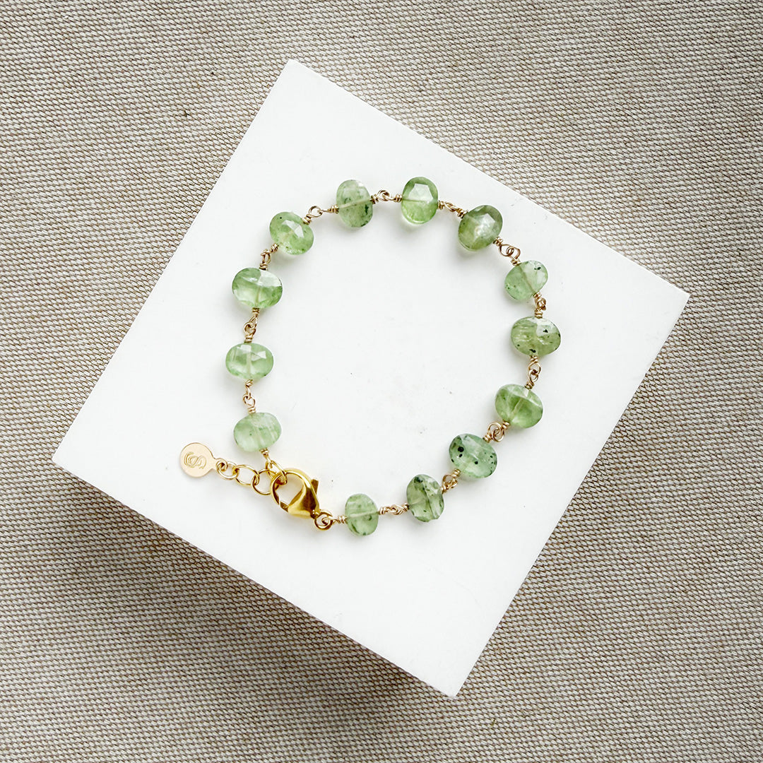 Green Kyanite bracelet on a white dish