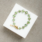 Green Kyanite bracelet on a white dish
