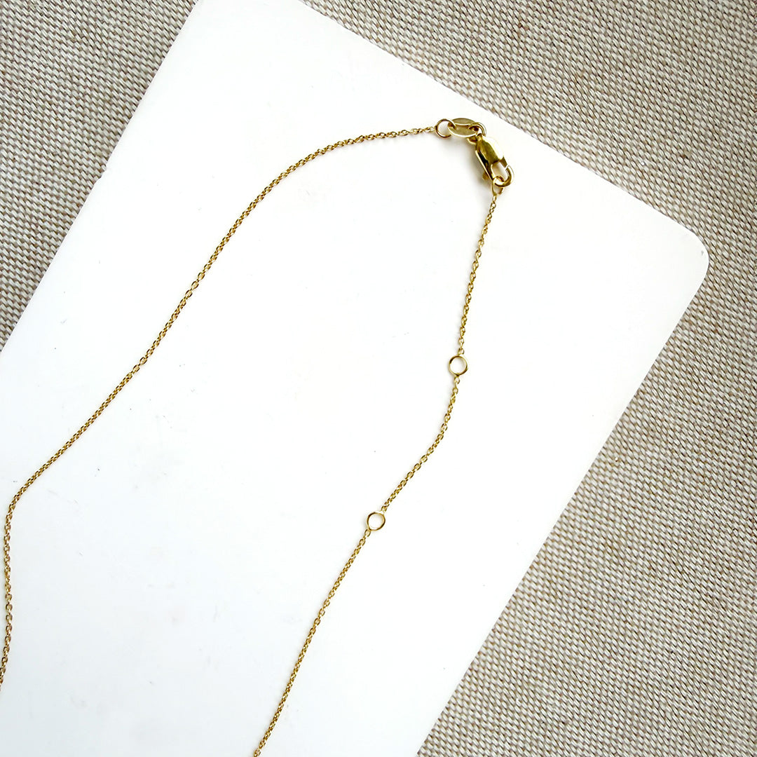 Clasp detail of Golden Hills turquoise pendant necklace in solid gold on a white background 