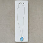 Golden Hills Turquoise pendant necklace on a white card.