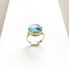 One of a kind Golden Hills turquoise mixed metal ring on a white background