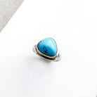 One of a kind Golden Hills turquoise mixed metal ring on a white background