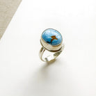 One of a kind Golden Hills Turquoise silver ring on a white background