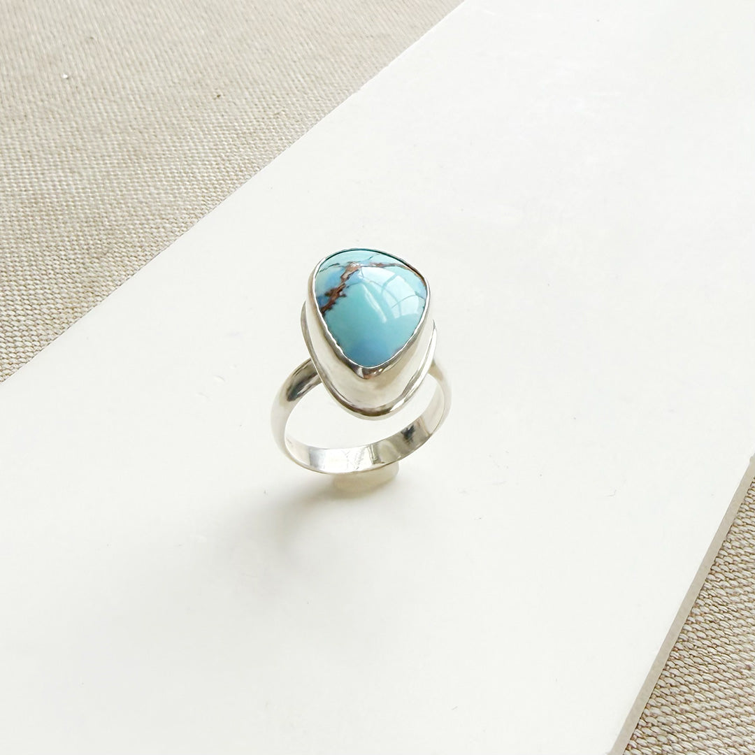One of a kind Golden Hills Turquoise silver ring on a white background