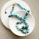 Golden Hills Turquoise knotted necklace in a white dish