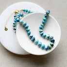 Golden Hills Turquoise knotted necklace in a white dish