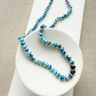 Golden Hills Turquoise knotted necklace in a white dish