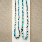 Size comparison of two knotted Golden Hills turquoise necklaces