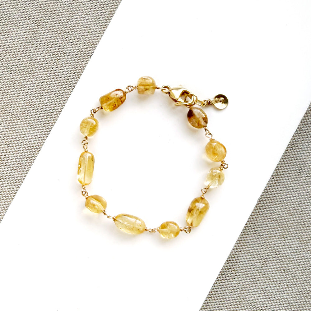Imperial topaz bracelet on a white background