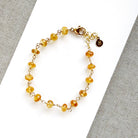 Imperial topaz bracelet on white plate