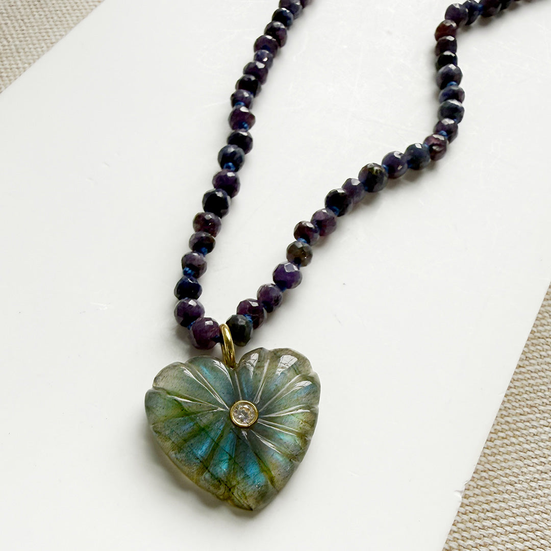 Heart shaped carved labradorite pendant with purple gemstone knotted necklace