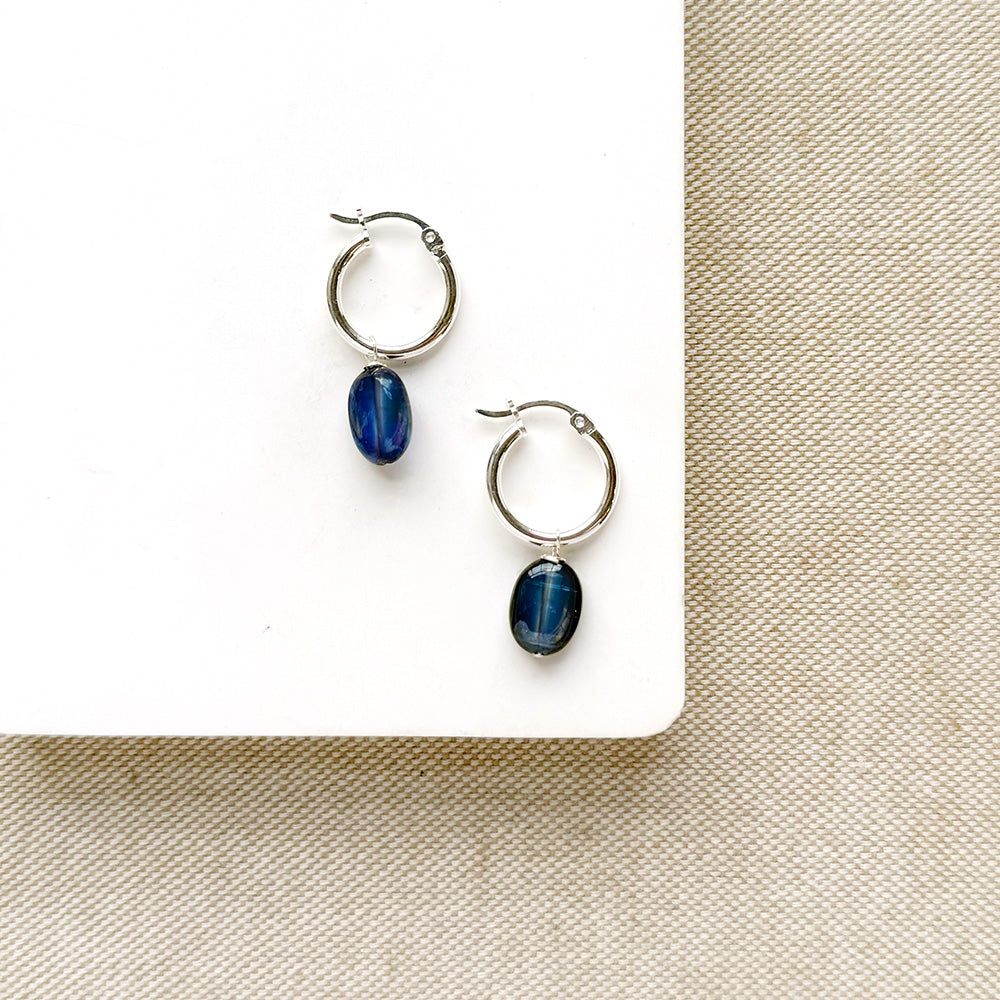 Silver hoop earrings with blue kyanite gemstone drop
