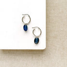 Silver hoop earrings with blue kyanite gemstone drop