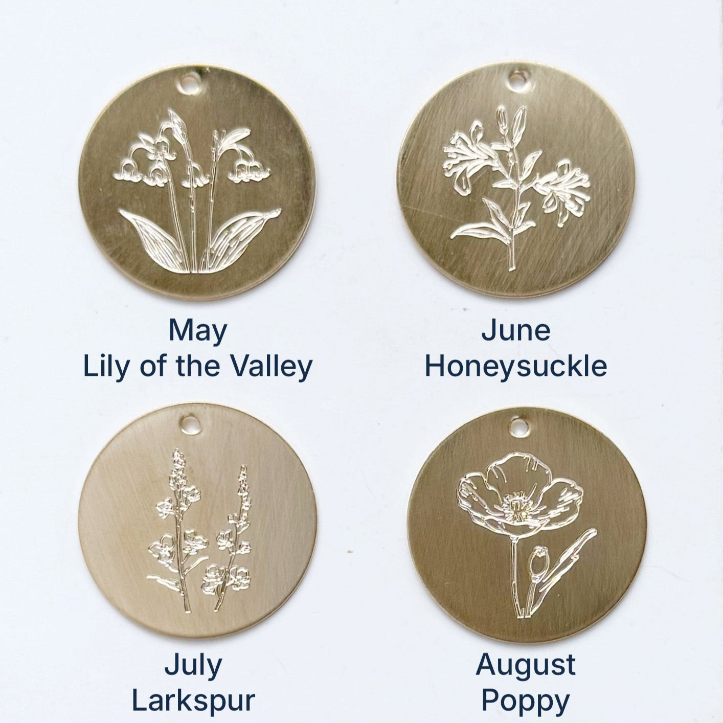 Discs showing birth flowers for May through August