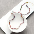 Spinel knotted necklace in a white dish
