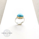 One of a kind Golden Hills turquoise mixed metal ring on a white background