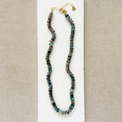 Knotted Labradorite necklace on a white plate