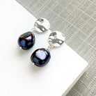 Peacock pearl earrings with a silver disc