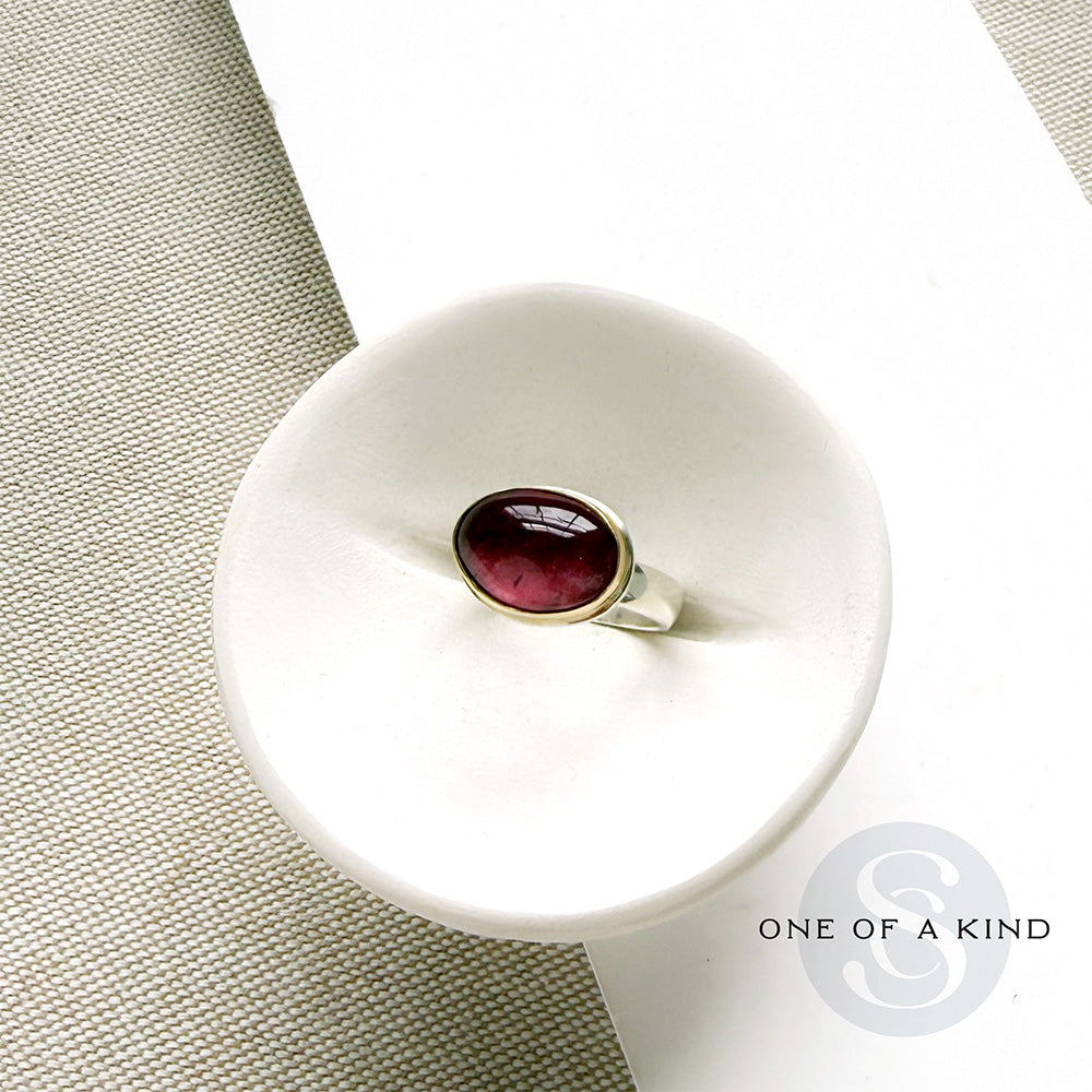 Pink Tourmaline Mixed Metal ring in a dish