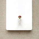 Pink Tourmaline Mixed Metal ring in a dish