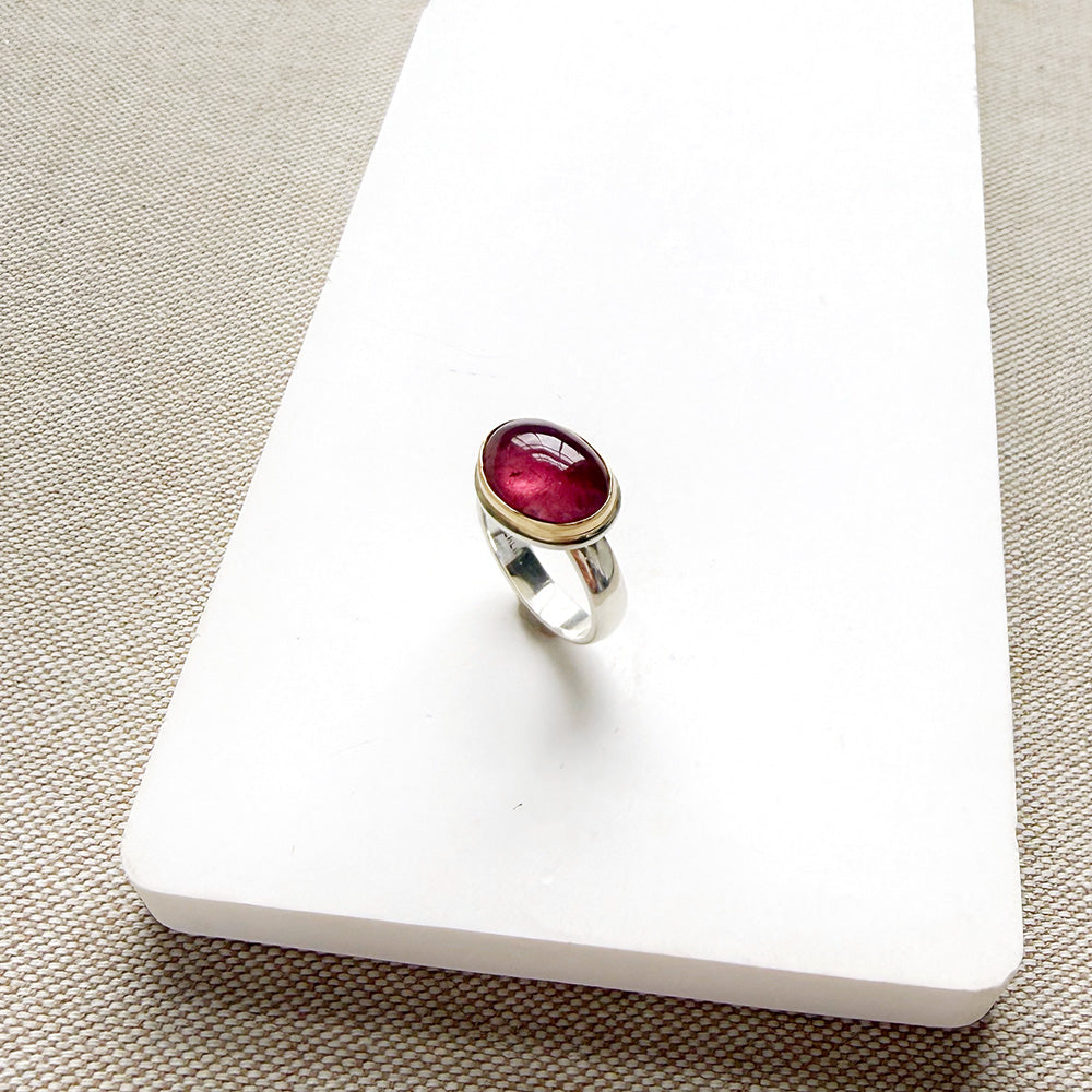 Pink Tourmaline Mixed Metal ring in a dish