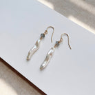 Stick pearl earrings with small labradorite gemstones