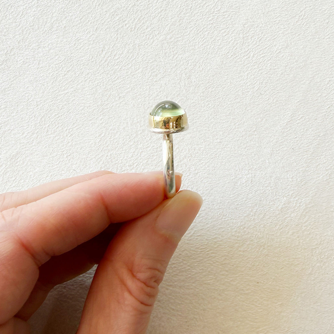 Side view of a green prehnite gemstone ring.