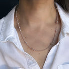 Option 2 worn as a Necklace by a person with a white shirt