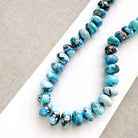 golden hills turquoise necklace with 12.5 - 14 mm size beads on a white background