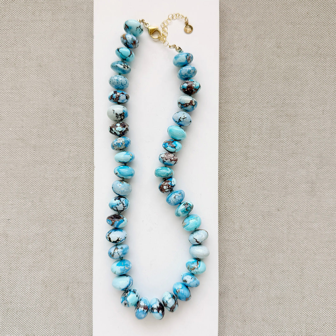 golden hills turquoise necklace with 12.5 - 14 mm size beads on a white background