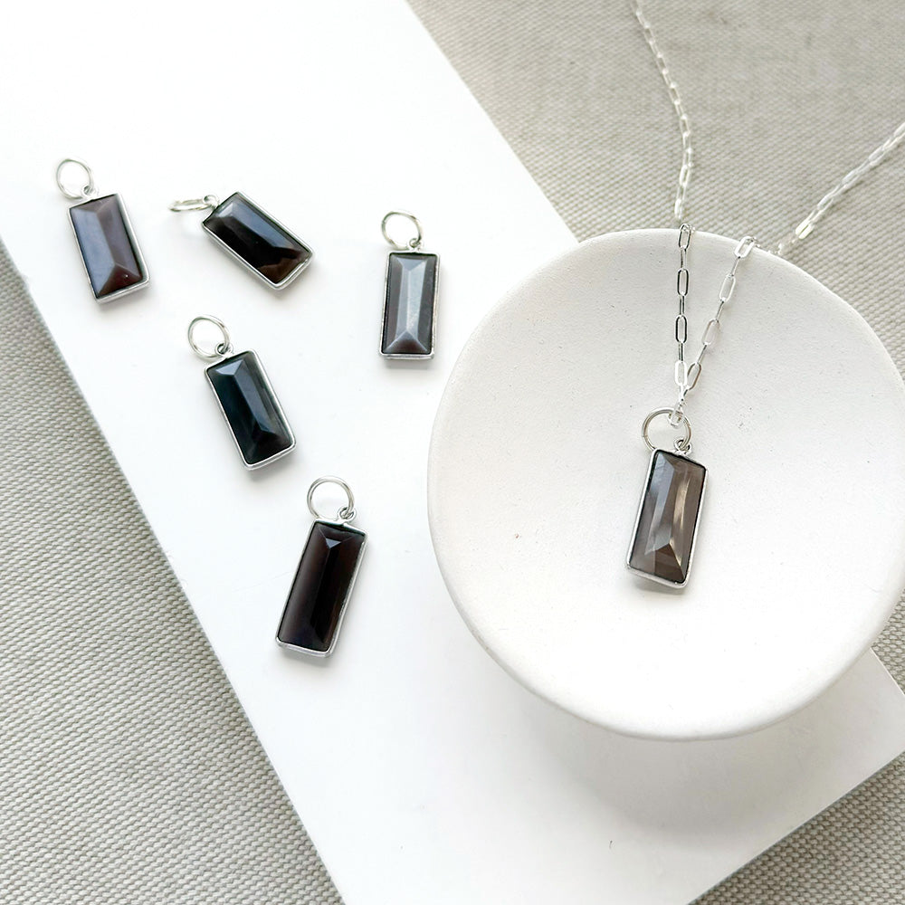 Rectangular bezel set coffee moonstone charm in silver