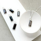 Rectangular bezel set coffee moonstone charm in silver