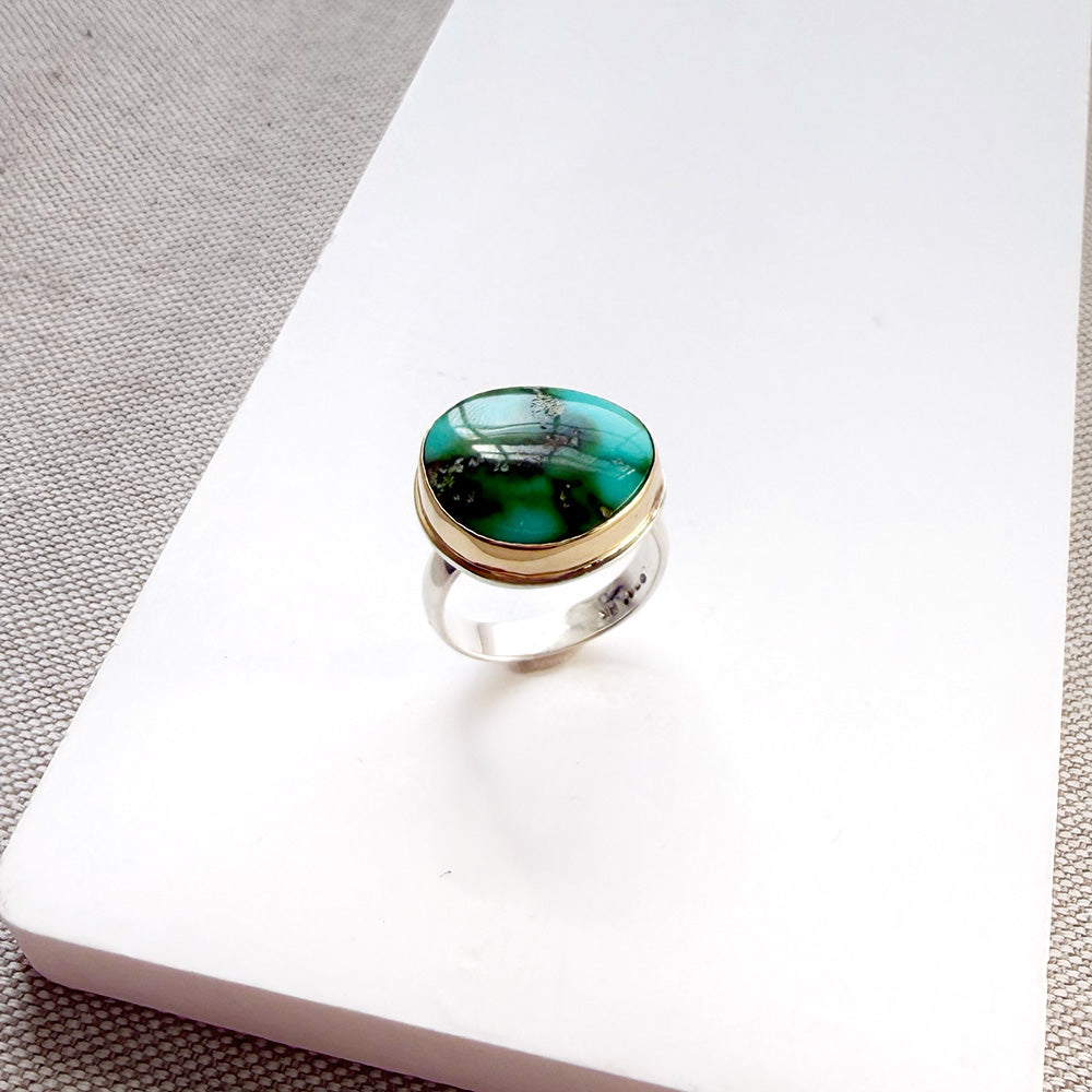 Sonoran Turquoise mixed metal ring on a white background